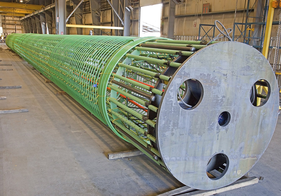 An epoxy-coated rebar cage awaits shipment from Dimension Fabricators warehouse.