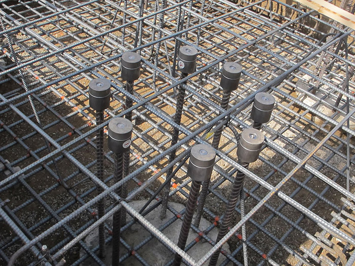 HRC Rebar Couplers on a large fabricated rebar grid under construction.