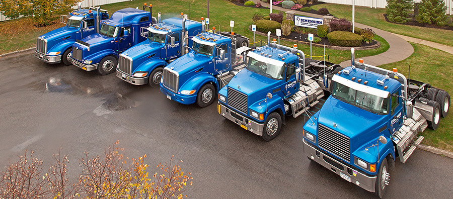 Aerial view of the Dimension Fabricators Fleet of delivery trucks.